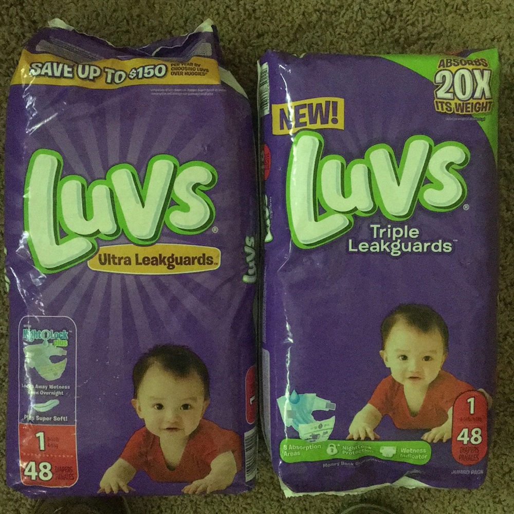 Two packs of size one diapers